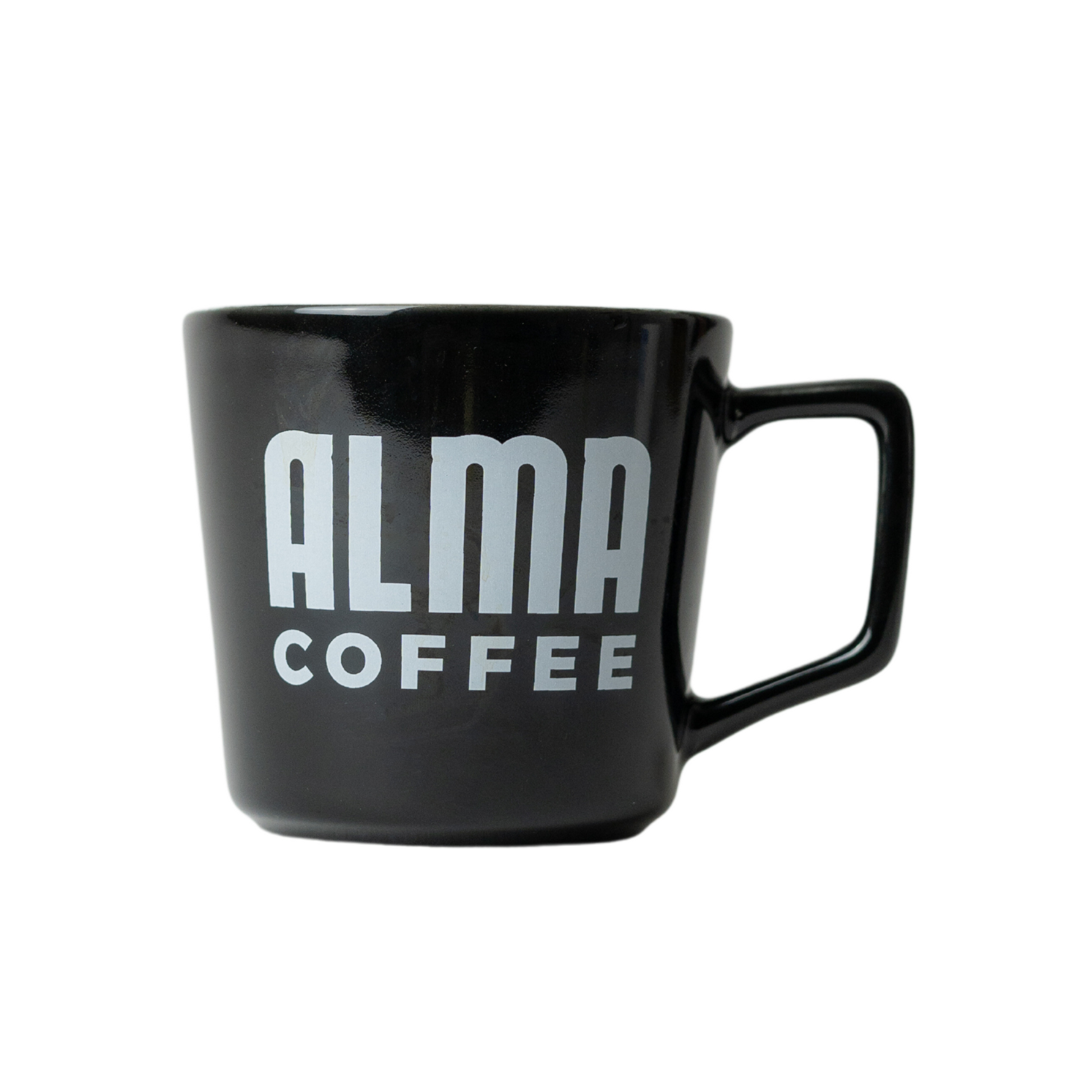 black angled mug with alma coffee logo