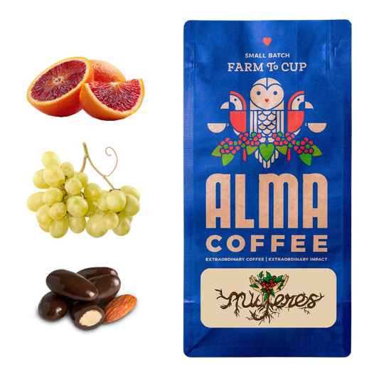 Alma Coffee package with blood oranges, grapes, and chocolate truffles on a white background