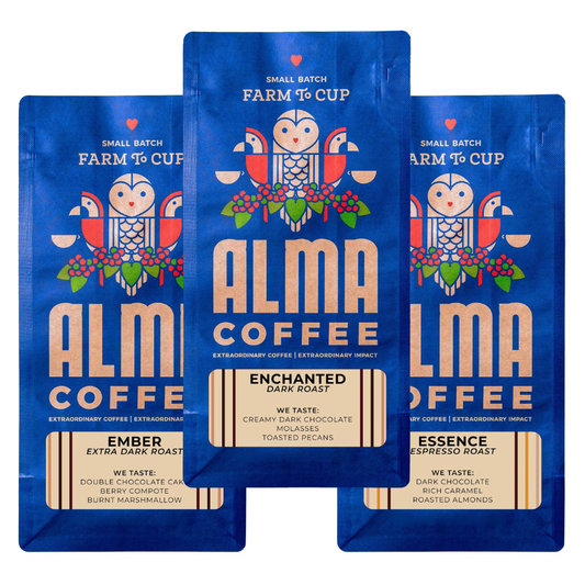 Three packages of Alma Coffee with blue and white design on a white background