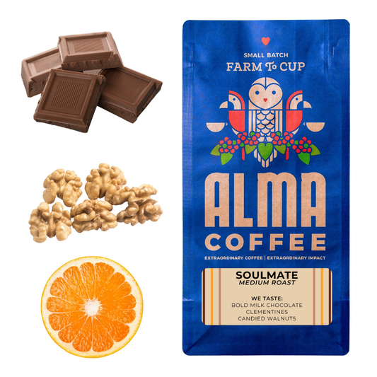 Alma Coffee package with chocolate, walnuts, and an orange slice on a white background